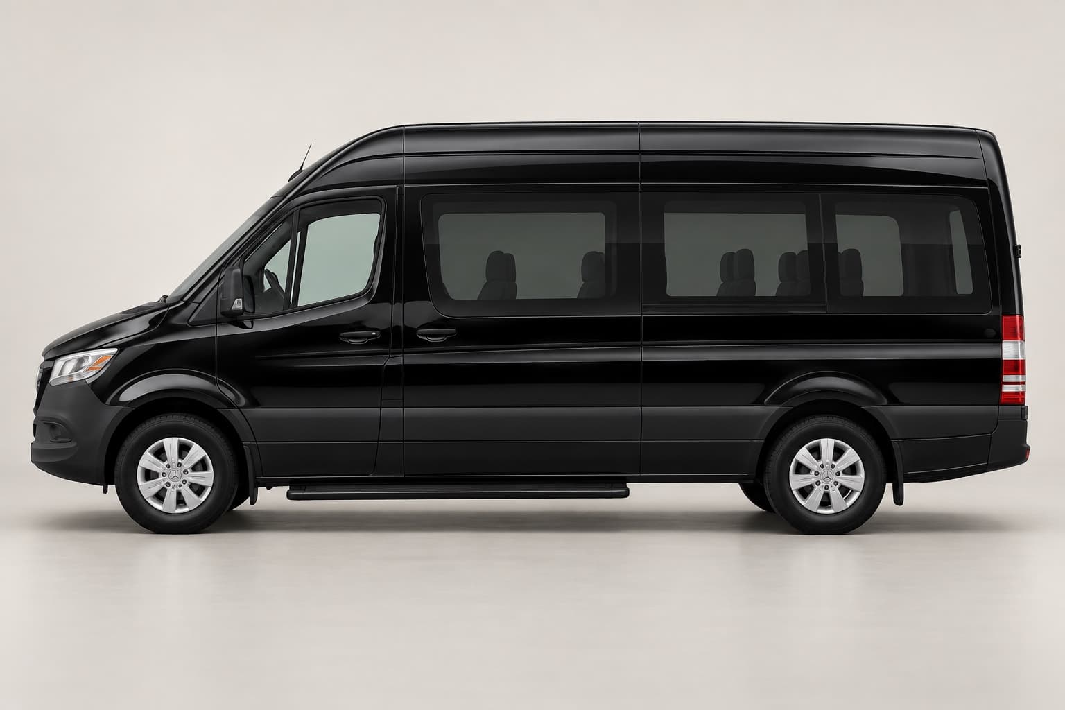 Black Mercedes-Benz Sprinter passenger van in side profile on a neutral studio background